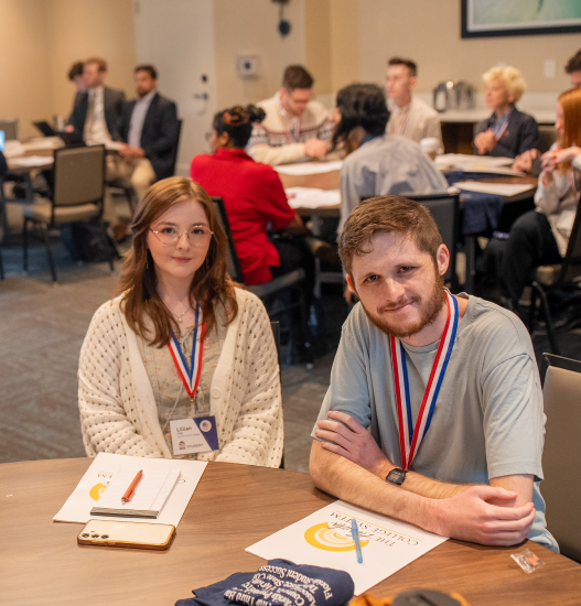 NFC Students Lillian Clay and Ben Collazo prepare for debate.